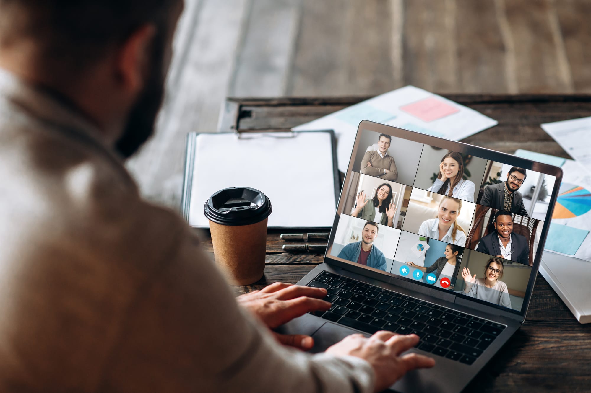 A team meeting on a video call across locations